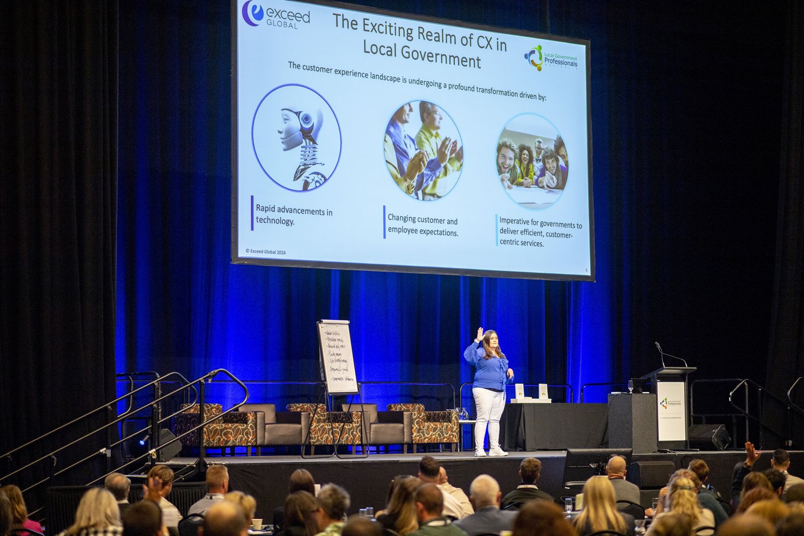 Isabella Villani presenting on stage to a full auditorium at the LG Professionals SA Annual State Conference