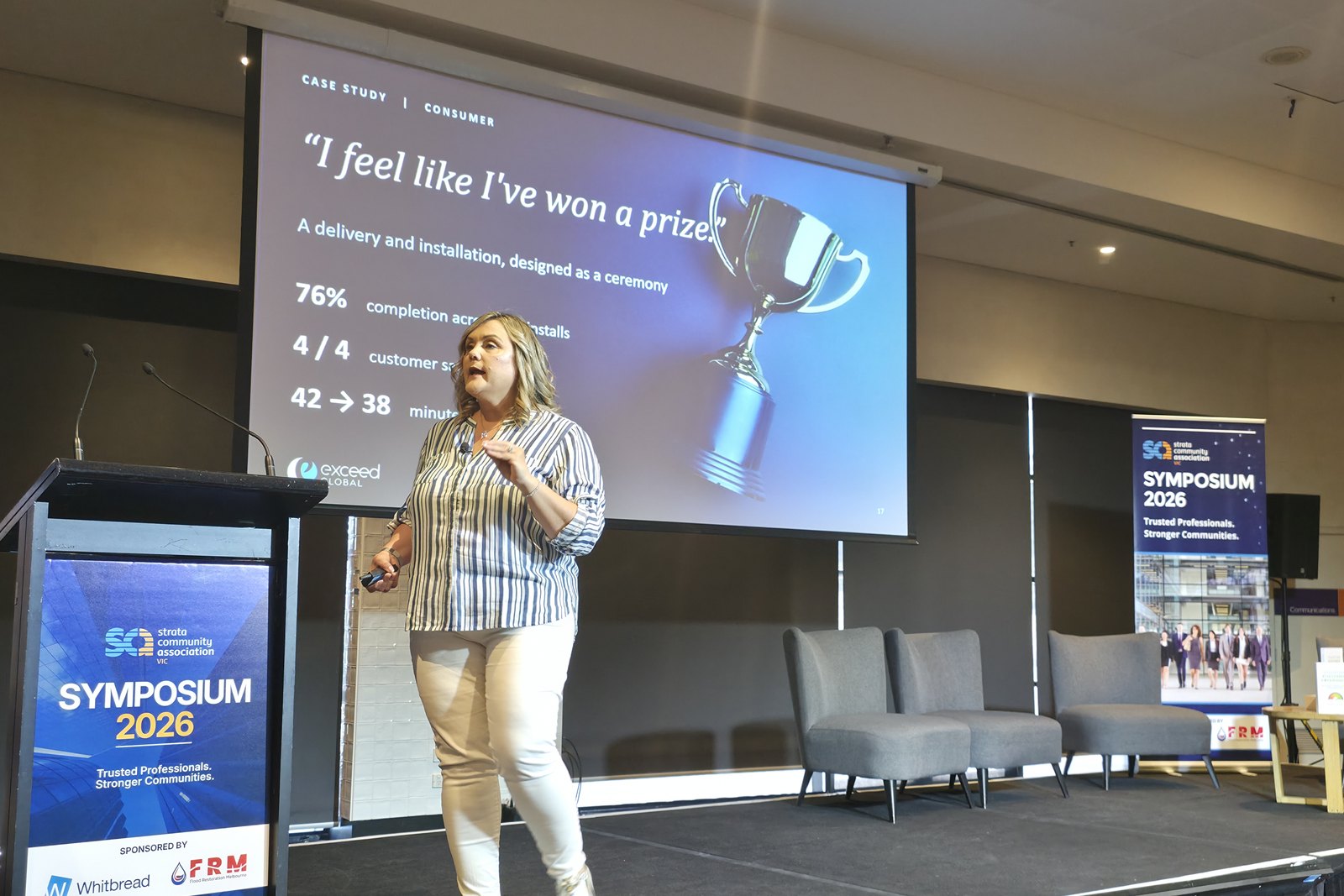 Isabella Villani delivering the closing keynote at the SCA (Vic) Symposium 2026, with a slide reading I feel like I've won a prize behind her